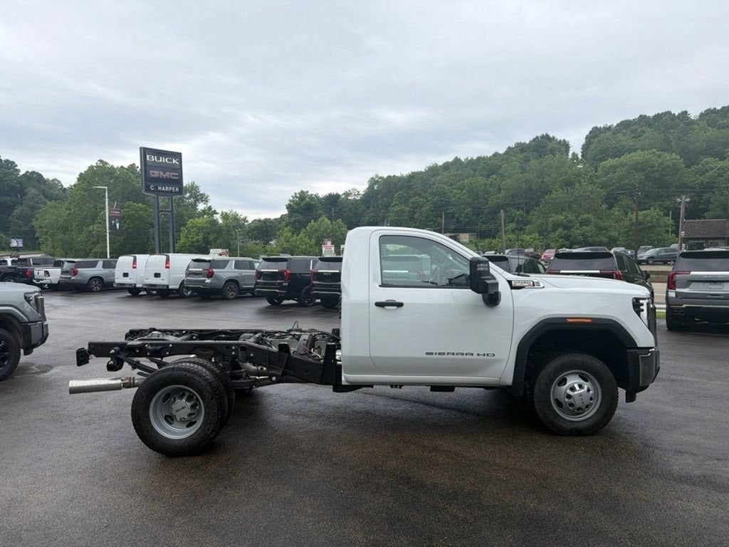 2026 GMC Sierra 3500 HD Pro DRW in Summit White — front three-quarter view